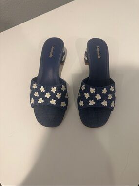 Larroude denim and white daisy slides